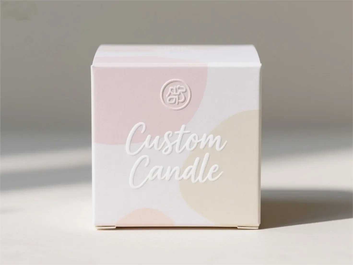 Minimalist custom candle box in pastel colors with embossed brand logo Minimalist custom candle box in pastel colors with embossed brand logo